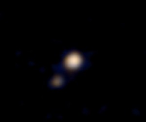 Первый цветной снимок системы Плутон-Харон