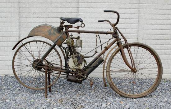 старинный моторизованный велосипед