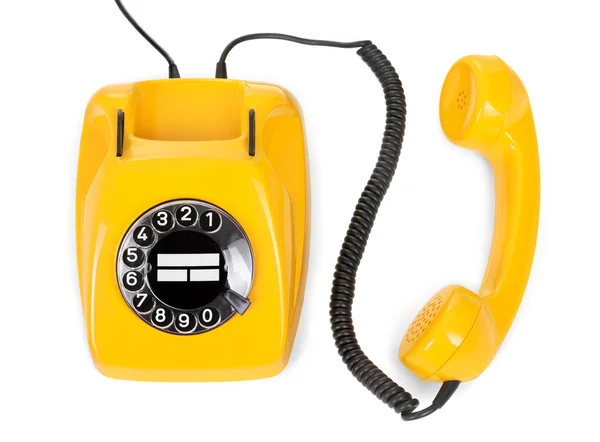 Желтый вращающихся телефон — стоковое фото