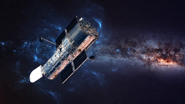 Космический телескоп Хаббла на орбите над Землей. Элементы этого изображения, предоставленной НАСА — стоковое фото