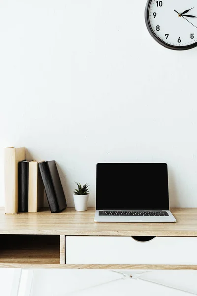 Laptop Blank Screen Books Work Desk Front White Wall — стоковое фото