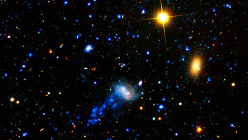 Галактика-медуза IC 3418