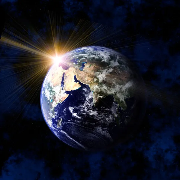 Земля и солнце из космоса — стоковое фото
