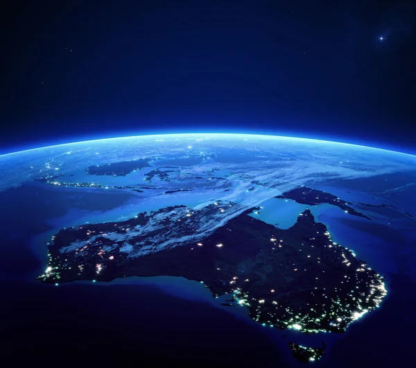 Австралия с огни города из космоса ночью — стоковое фото