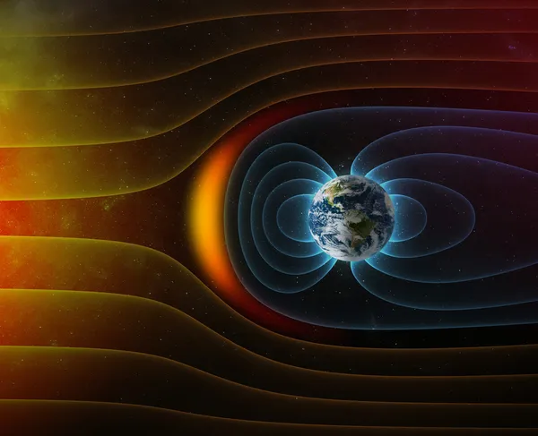 Магнитное поле планеты Земля s против солнца s Солнечный ветер — стоковое фото