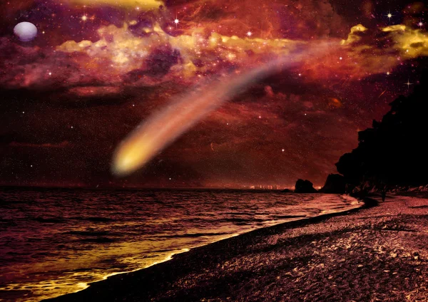 Летать через пространство близко к земле комета — стоковое фото