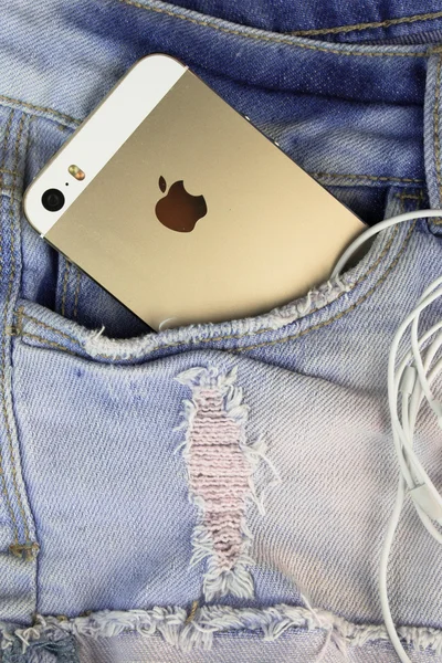 Золото Apple iphone 5s в голубой джинсовый карман 