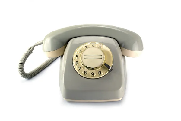 Винтажные вращающихся телефон, серый пожелтевшие пластиковые на белый му — стоковое фото