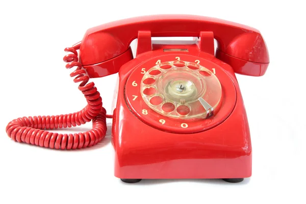 Старинный красный телефон — стоковое фото
