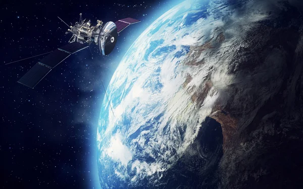 Спутниковое и земля — стоковое фото